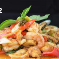42. Phad Phet Talay · Stir-fried seafood combination with Thai pepper corn, onions, bell peppers and sweet basil i...