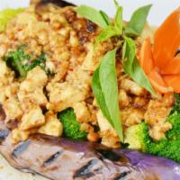 55. Thai Grilled Eggplant · Marinated grilled Chinese eggplant, steamed broccoli, stir fried fresh tofu and fresh garlic...