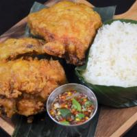 62. Bangkok Fried Chicken · Our signature golden fried Bangkok style marinated chicken served with sticky rice, steamed ...