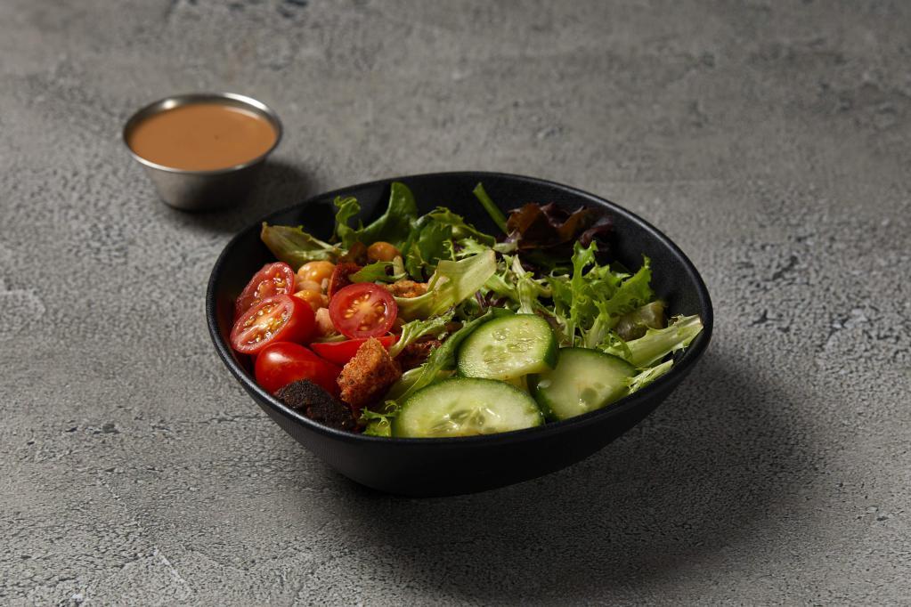 Salad Creation · Pick your greens and five topping of your choice included.