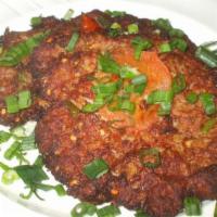 Chapli Kabab Chicken · Ground chicken with tomatoes, green onion, serrano chilies, garlic, ginger, coriander, fresh...