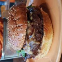 Hanger Steak Burger · Beef burger stuffed with smoked Gouda cheese topped with steak sauce, grill onions, smoked
G...