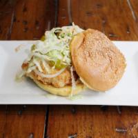 Buttermilk Fried Chicken Sandwich · Spicy mayo, shredded lettuce, pickle chips and white onions, served on sesame seed bun 