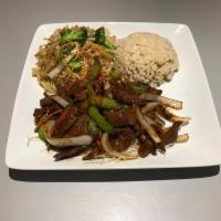 V. Mongolian Beef Combo · Slices of tender beef sauteed with onion in gourmet sweet brown sauce.