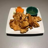 3. Crispy Chicken · Golden deep-fried chunks of breaded chicken served with sweet and sour chili sauce.