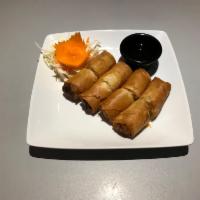 5. Crispy Veggie Spring Rolls (4) · Special crispy egg roll wrapper stuffed with vegetables then deep-fried, served with lime sa...