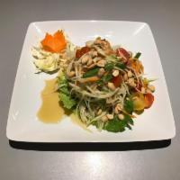 8/c. Som Tum (Thai Green Papaya Salad) · Shredded green papaya, carrots, green beans, tomato, peanut, fresh garlic tossed in lime dre...