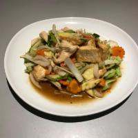 23. Stir-Fried Tofu · Sauteed pan-fried tofu, bean sprouts and a combination of vegetables with your choice of meat.