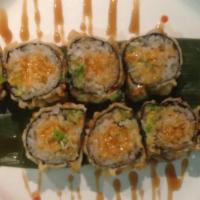 21. Yankee Specialty Roll · Spicy tuna, spicy salmon, tamago, red snapper avocado and deep fried.