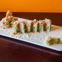 31. Charlie Specialty Roll · Shrimp tempura, mango, avocado, crabmeat and crunch on top.