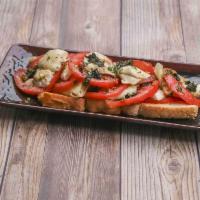 Caprese Salad · Fresh tomatoes, fresh mozarella, pesto and olive oil.