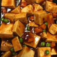 57. Ma Po Tofu · Served with white rice. Hot and Spicy and vegetarian.