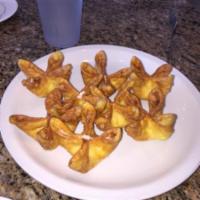 27. Crab Rangoons · 8 pieces. Crisp wonton wrapper filled with crab cream cheese.