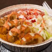 Aloo Rice Platter · Potato seasoned with ou specialty spices. Served over a bed of our signature yellow rice wit...