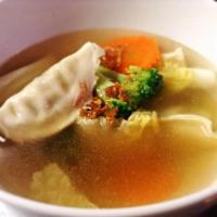 Dumpling Soup · Vegetable dumplings with assorted vegetables in clear broth.  Scallion and Cilantro.