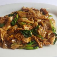 Pad See Ew Noodles · Large flat noodles stir fried with Chinese broccoli, choice of your favorite meat, egg in sp...