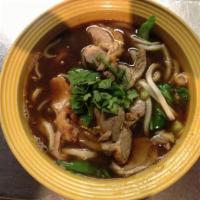 Duck Noodle Soup · Slices on boneless duck in soy sauce and Asian spices soup with shitake mushroom, bean sprou...