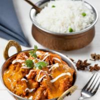 Butter Chicken · (GF) An Indian menu classic, pulled chicken charred in the tandoor oven then finished in a c...