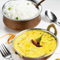 Dal Tadka · (GF) (Can be made Vegan upon request) Simmered yellow split lentils tempered with cumin, mus...