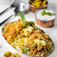 Vegetable Biryani · Vegetable rice casserole. Aromatic rice, fresh cut vegetables, select spices cooked to perfe...