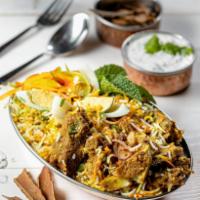 Goat Biryani (Bone In) · (GF) Hearty vegetables/meat and rice casseroles cooked with flavorful herbs & spices. Served...