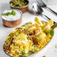Egg Biryani · (GF) Hearty vegetables/meat and rice casseroles cooked with flavorful herbs & spices. Served...