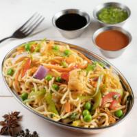 Hakka Noodles · Soft noodles tossec in a wok with fresh vegetables, sauces and condiments.