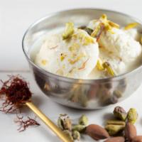 Rasmalai · Spongy cottage cheese balls dunked in an aromatic molk concoction. Vegetarian.