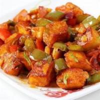 Chilli Paneer · Fried paneer coated with butter and cooked in Indo Chinese style.