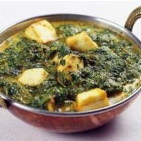 Saag Paneer · Cheese cubes and spinach cooked with spices and gravy sauce.