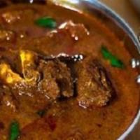 Goat Karaikudi Curry · Goat sauteed and cooked in mild sauce and spices in chettinad style