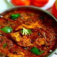 Chicken Kadai Curry · Chicken cooked in kadai sauce.