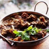 Goat Kadai Curry · Chicken cooked in kadai sauce.
