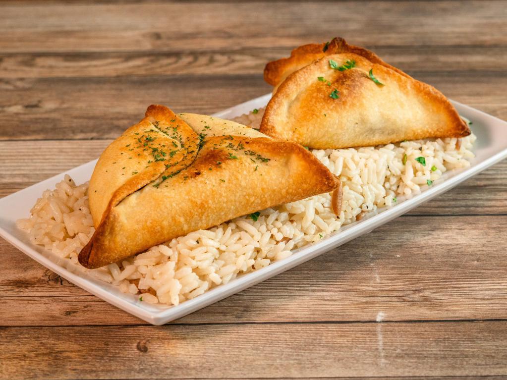 2 Pieces Fatayer · Served with rice and green beans.