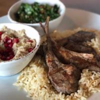 Lamb Chops Plate · 3 baby lamb chops marinated in Mediterranean spices. Served with rice, salad, hummus & pita ...