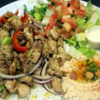 Shawerma Plate · Beef or Chicken Shawerma. Served with rice, salad, hummus & pita bread. Substitutions of sid...