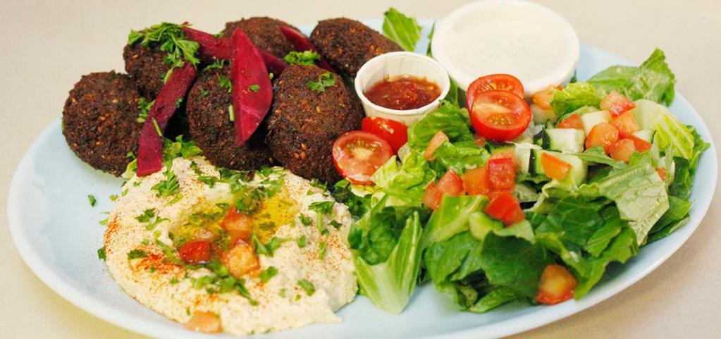 6 Piece Falafel Plate · 6 Falafel patties served with hummus and tahini salad, tomatoes, turnips, tahini sauce,and pita bread. Substitutions of sides available.