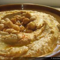 Hummus · A smooth medley of crushed chickpeas, garlic, lemon juice, tahini sauce and drizzled with ol...