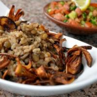 Mujaddara · Lebanese dish of rice and lentils topped with fried onions. Vegetarian.