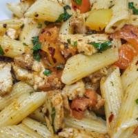 Penne Pomodoro · Fresh basil, chopped tomatoes, chicken, garlic and red peppers flakes on penne. Served with ...