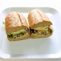 19. Vegy Vegy Sandwich · Choice of cheese, cucumbers and avocado. All sandwiches made with everything unless otherwis...