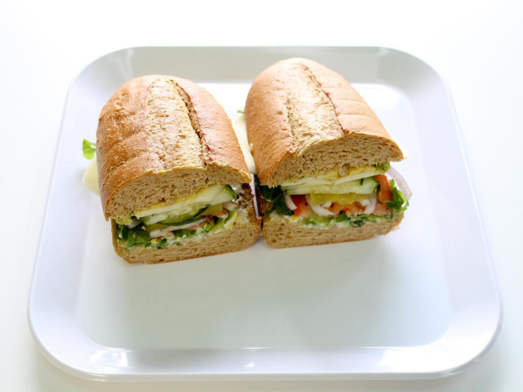 19. Vegy Vegy Sandwich · Choice of cheese, cucumbers and avocado. All sandwiches made with everything unless otherwise specified.