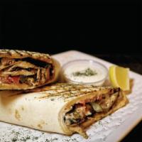 Chicken Shawarma Sandwich · Chicken shawarma, tomatoes, lettuce, pickles and garlic sauce wrapped in markook bread.