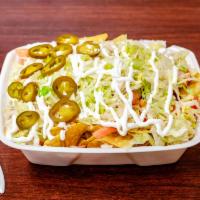 Super Nachos · Includes choice of meat, cheese, beans, lettuce, tomatoes, onions, sour cream, jalapenos and...