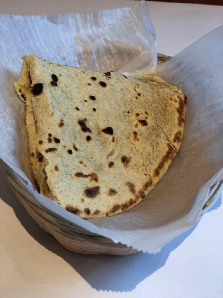 Chapati · Wheat bread grilled on a griddle and cooked on high fire.