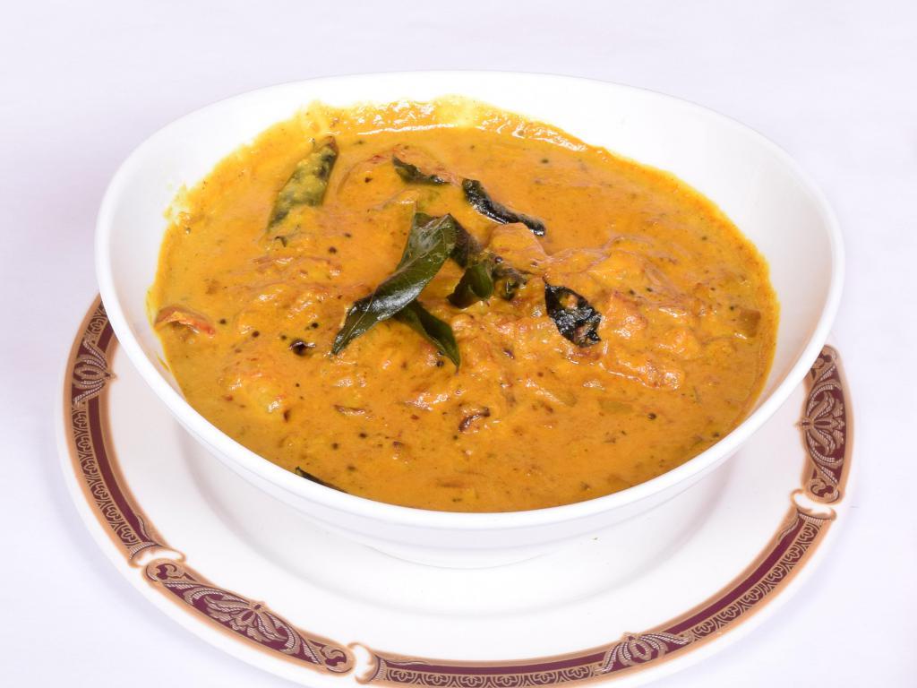 Manglorian Prawn · Prawns in coconut with ginger, southern spices and curry leaves.
