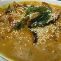 Bagara Baingen · Baby eggplant, sesame seeds, tamarind, coconut and peanuts. ŁServed with basmati rice. Hot. ...