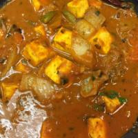 Kadai Paneer · Paneer cooked with onion, peppers, tomato in kadai masala .