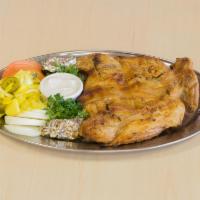 2. Whole Lemon Halal Chicken · Chicken opened like butter fly,cooked in a clay oven.Served with tomatoes, onions, pickles, ...
