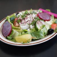 Greek Salad · House salad with feta cheese, beets and olives.